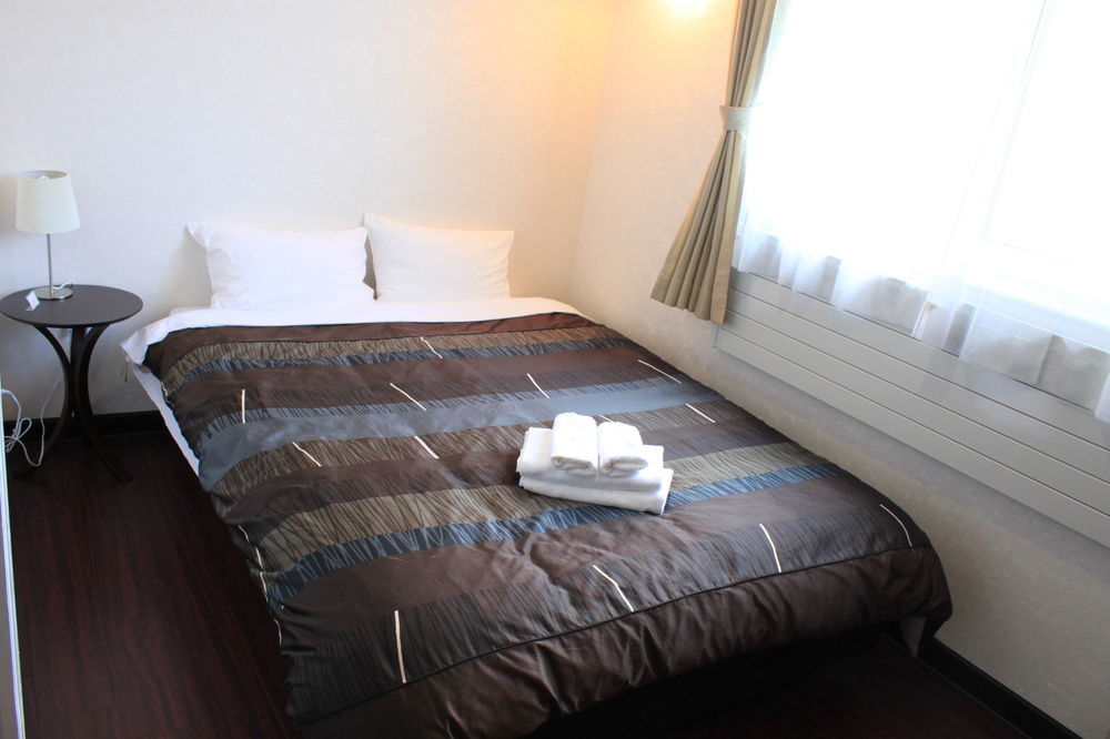 Petit Hotel Melon Nakafurano Buitenkant foto